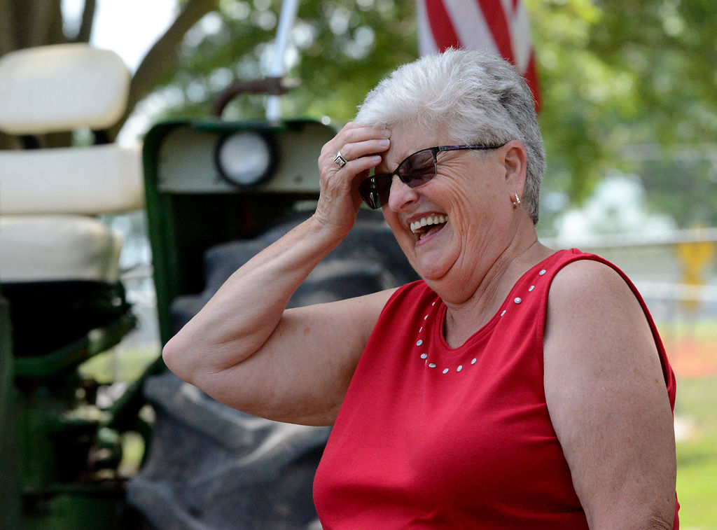 Linda Lynn laughs at a memory